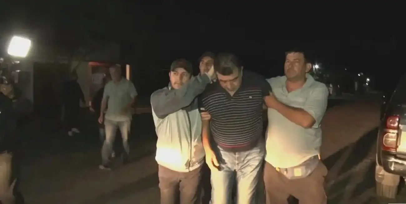 Carlos Pérez, en el momento de ser detenido, señalado como uno de los responsables del secuestro de Loan.