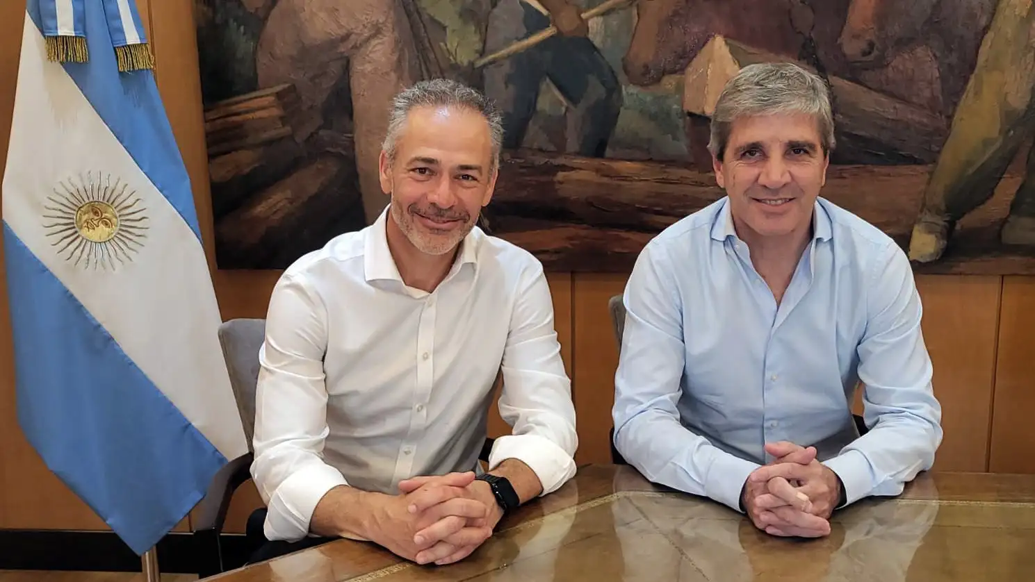 Alejandro Lew junto a Luis Caputo