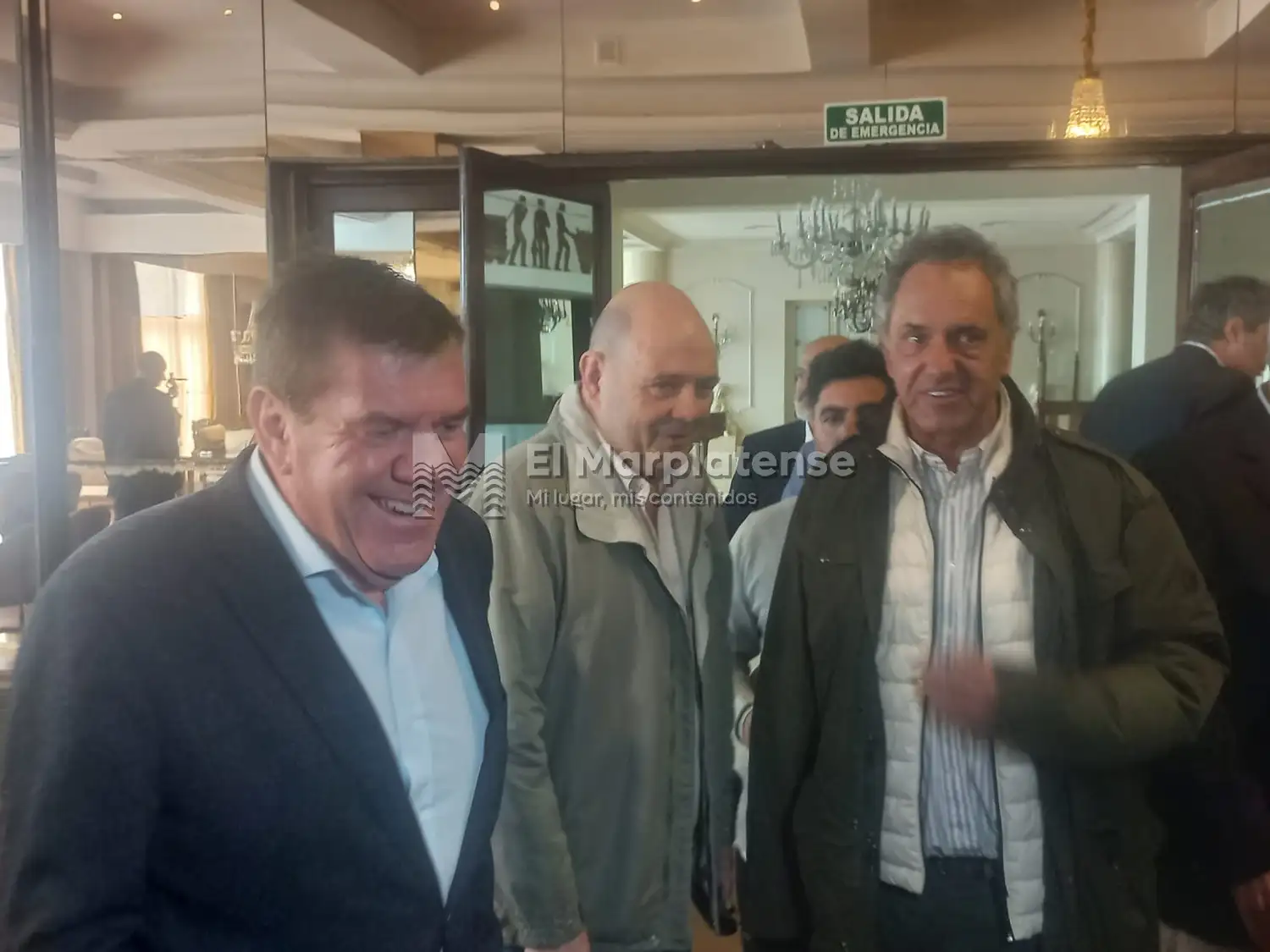 Guillermo Montenegro, Carlos Rottemberg y Daniel Scioli.