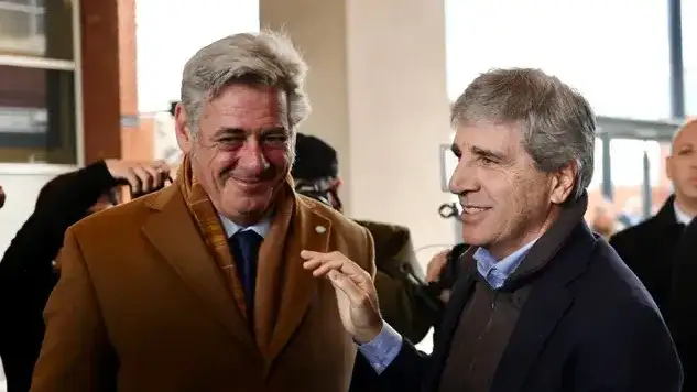 Caputo junto a Pino.