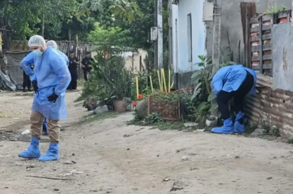 Mujer muerta en una balacera