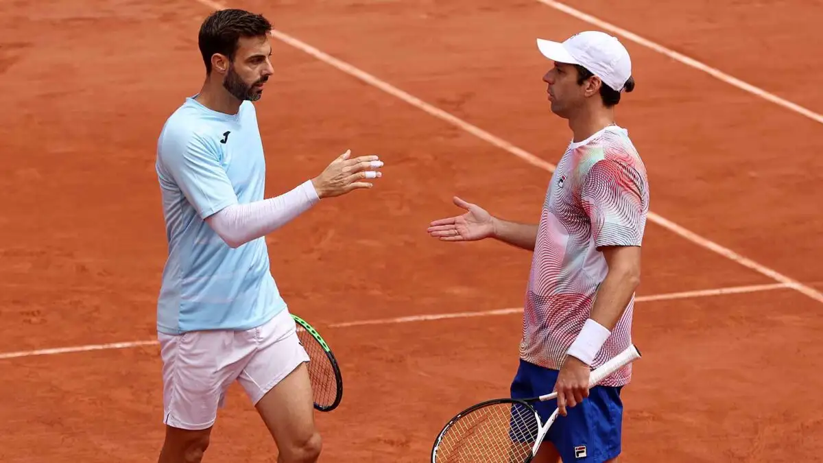 Horacio Zeballos y su compañero Marcel Granollers