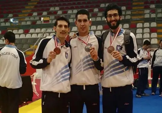 Los tres con medallas