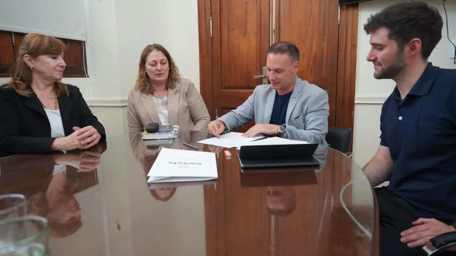 Bosco, Ciancio, Enrico y Yocco durante la firma del convenio en la capital santafesina