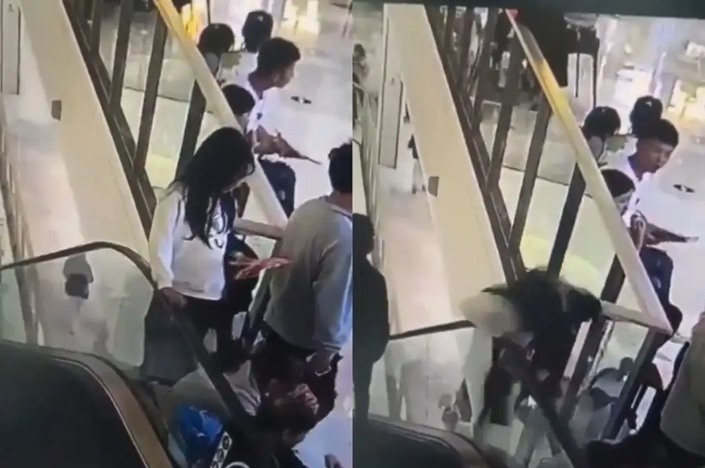 Cayó por la escalera mecánica